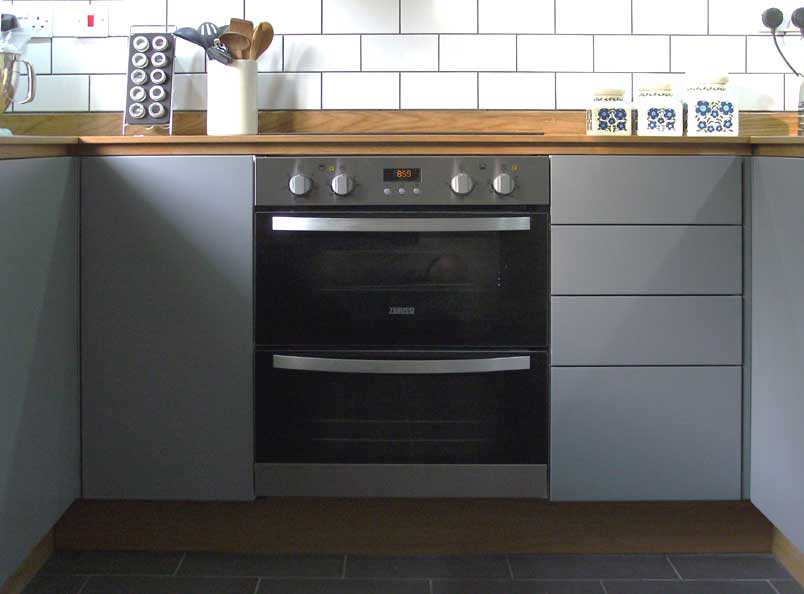 Wheeler Kitchen<br />Oak worktops with sprayed doors